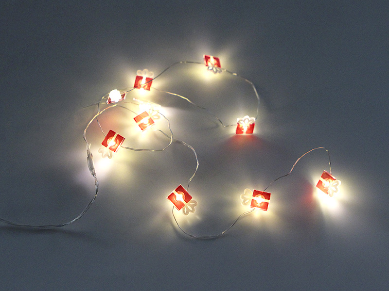 Imagem do produto CORDÃO LUMINOSO TASCHIBRA 10 LEDS PRESENTES PILHA 3000K na categoria NATAL CORDÃO